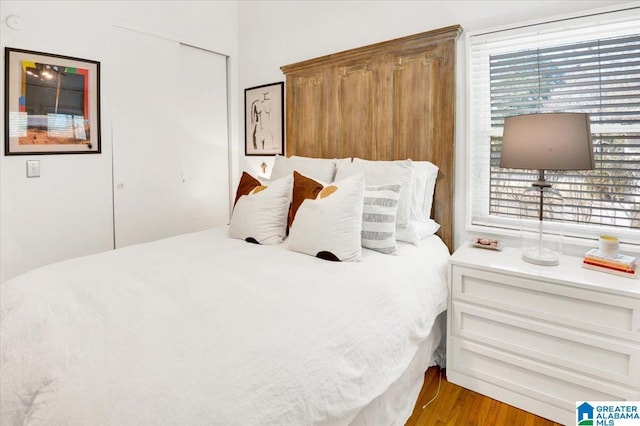 bedroom with wood finished floors