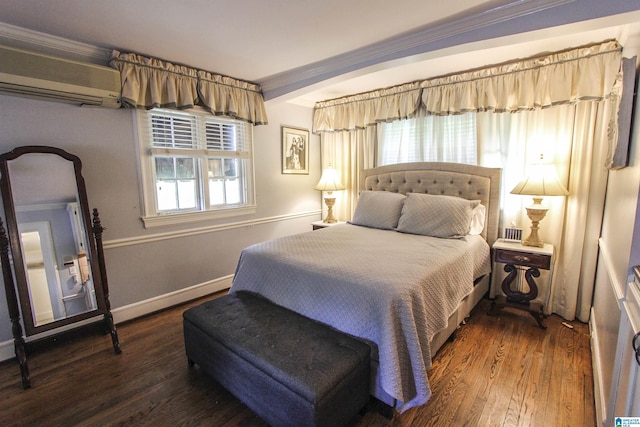 bedroom featuring dark hardwood / wood-style flooring and a wall mounted AC