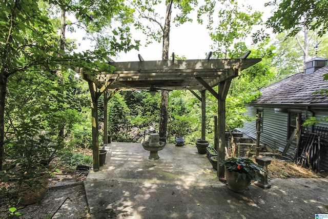 view of patio featuring a pergola