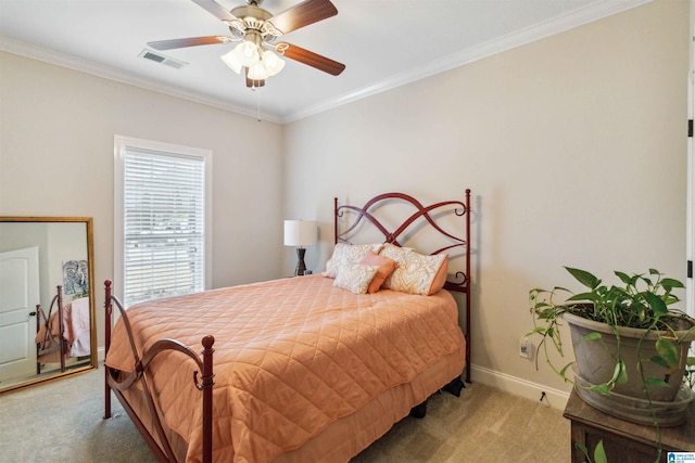 bedroom with crown molding, carpet, and ceiling fan