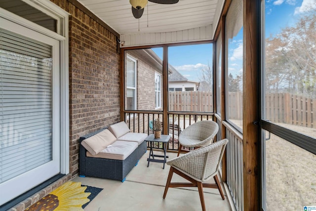 sunroom / solarium with ceiling fan