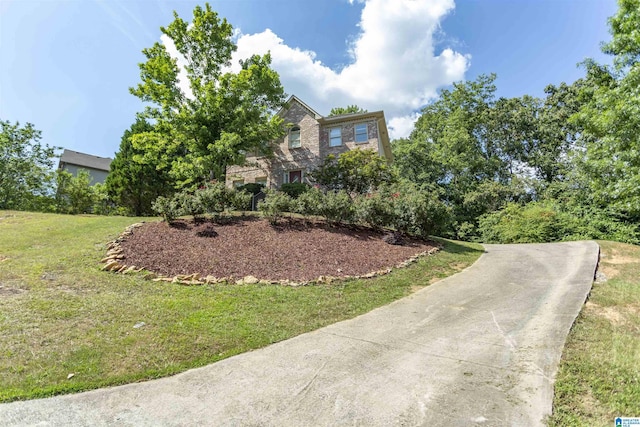 exterior space featuring a front lawn