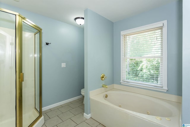 bathroom with tile patterned floors, toilet, and plus walk in shower