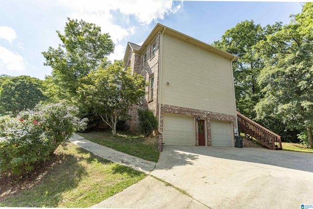 view of property exterior featuring a garage