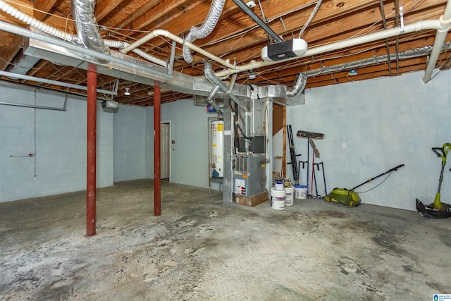 basement featuring heating unit and water heater