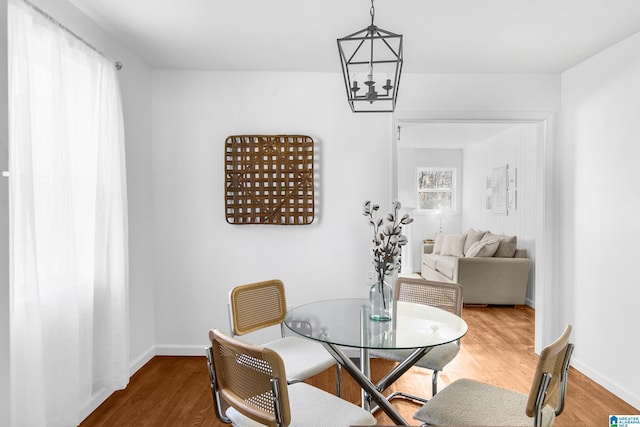 dining area featuring hardwood / wood-style floors