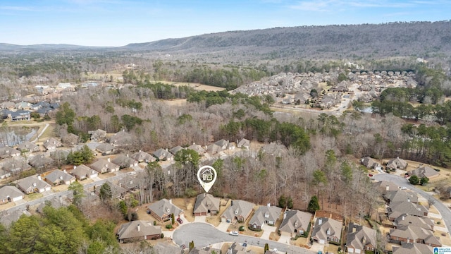 birds eye view of property featuring a mountain view