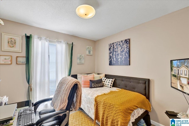 bedroom with a textured ceiling