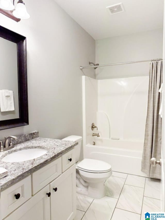 full bathroom with vanity, toilet, and shower / bath combo with shower curtain