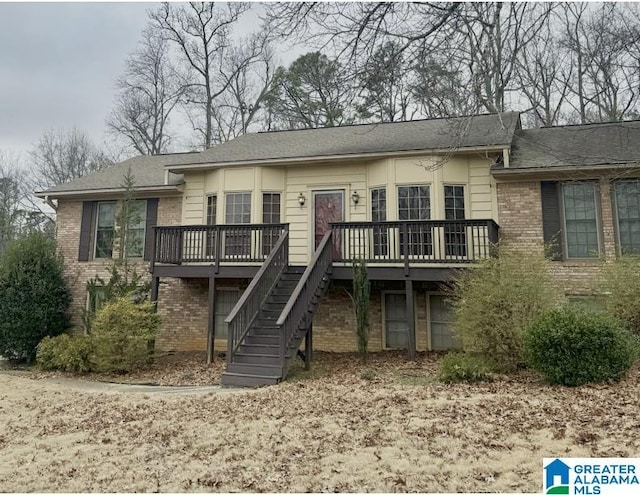 view of front of house with a deck