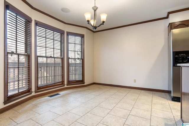 unfurnished dining area with ornamental molding, a chandelier, and light tile patterned floors