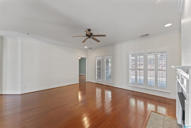 unfurnished living room with crown molding, ceiling fan, and wood-type flooring