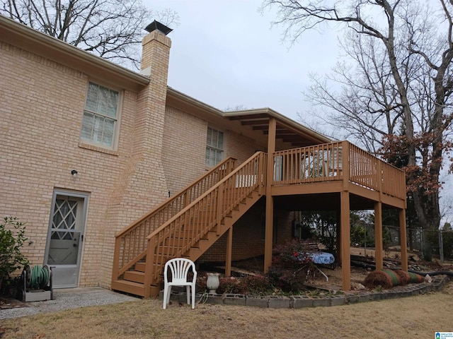 back of property with a wooden deck