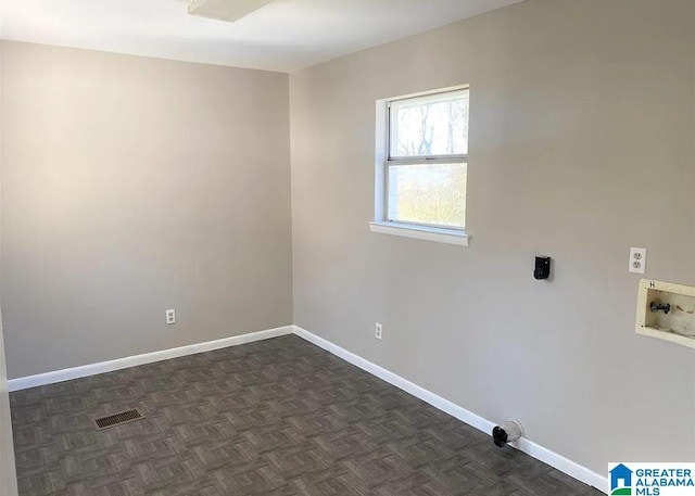 laundry room with washer hookup, dark parquet floors, and hookup for an electric dryer