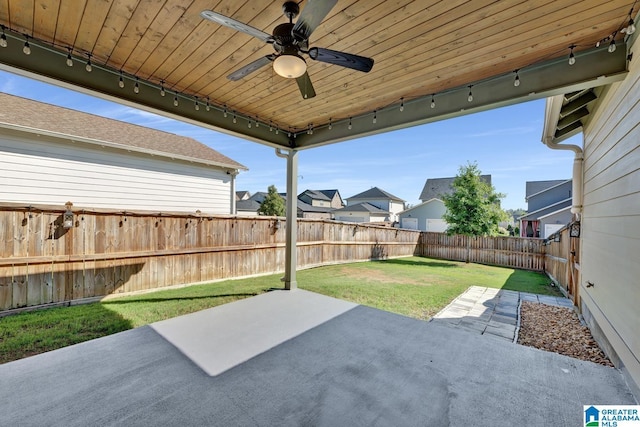 view of patio featuring ceiling fan