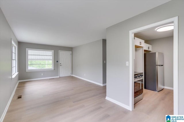 empty room featuring light wood-type flooring