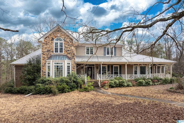 view of front of property featuring covered porch