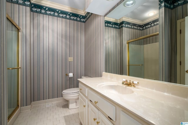 bathroom featuring tile patterned flooring, vanity, toilet, and walk in shower