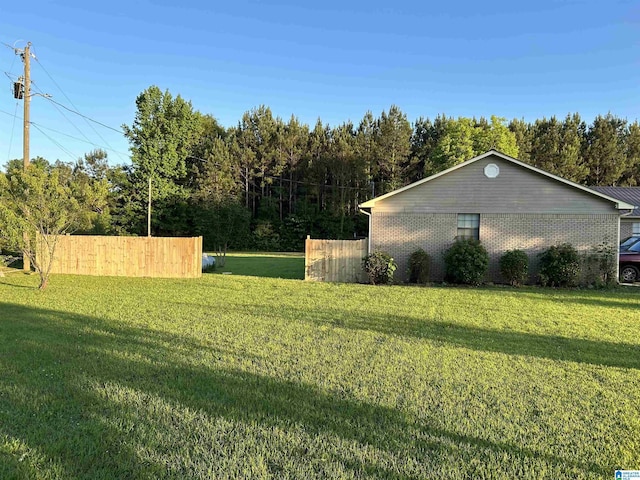 view of yard with fence