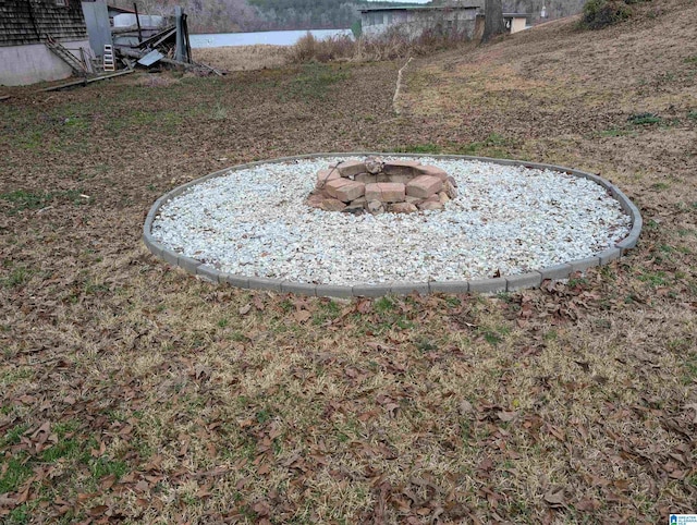 view of yard featuring a fire pit