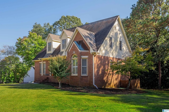 view of home's exterior with a yard