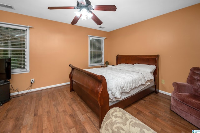 bedroom featuring ceiling fan and wood-type flooring