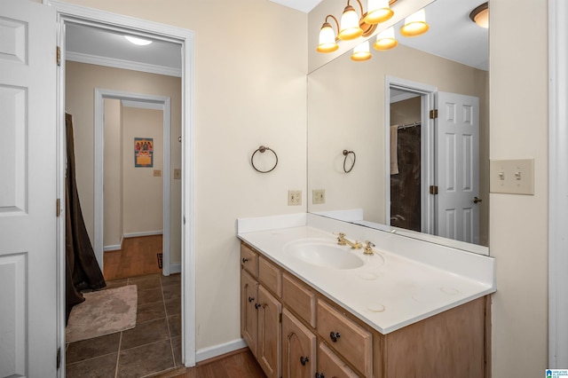 bathroom featuring vanity, tile patterned flooring, and ornamental molding