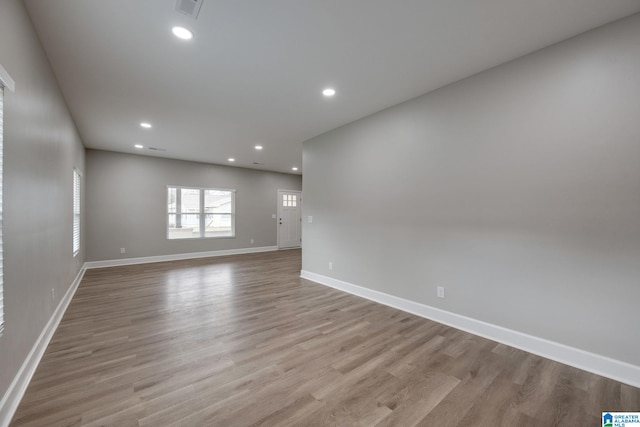 unfurnished room featuring light wood-type flooring