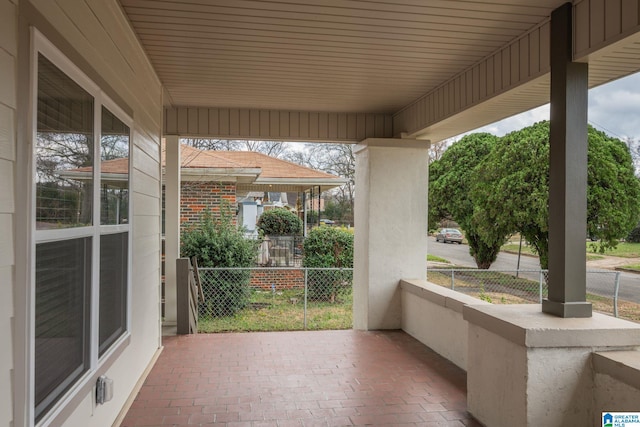 view of patio featuring a porch