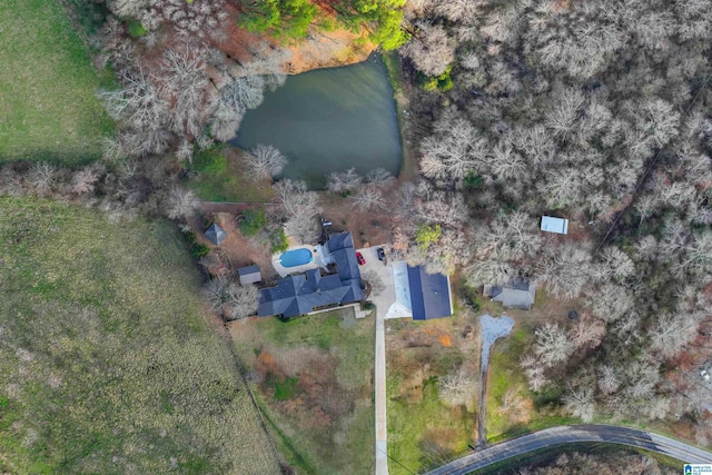 birds eye view of property featuring a water view