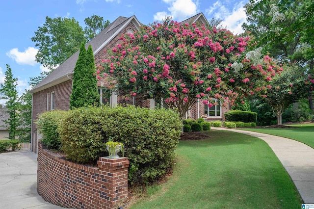 exterior space with a front yard