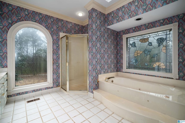 bathroom with tile patterned flooring, crown molding, and shower with separate bathtub