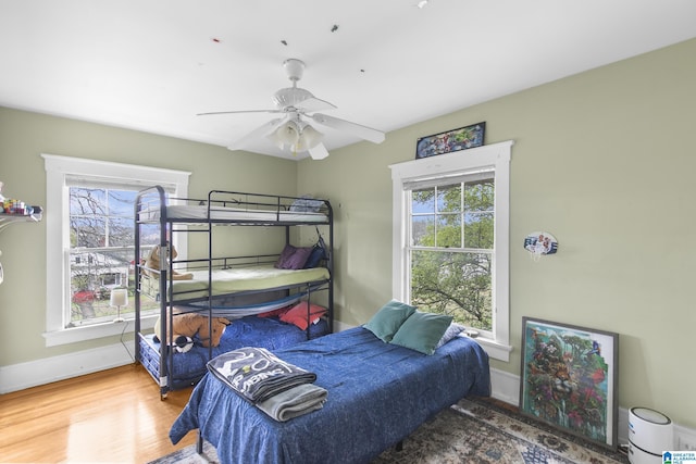 bedroom with wood-type flooring