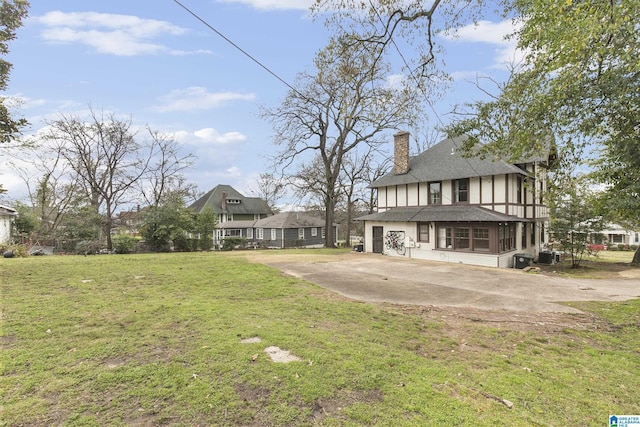 view of yard with a sunroom