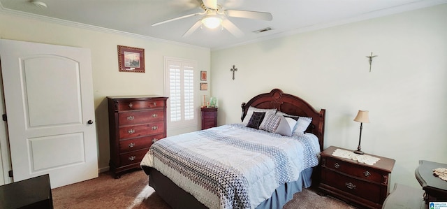 bedroom with crown molding, ceiling fan, and dark colored carpet