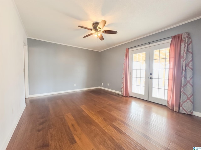 spare room featuring crown molding, french doors, and hardwood / wood-style flooring