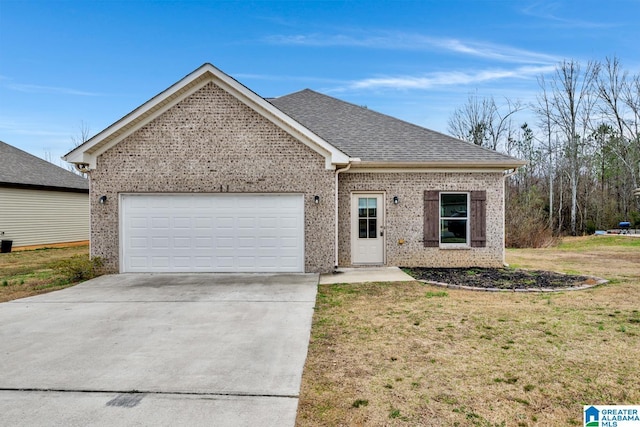 single story home featuring a garage and a front lawn