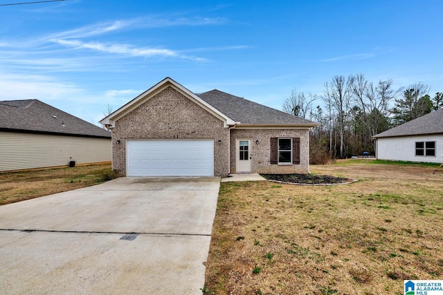 view of front facade featuring a garage and a front lawn