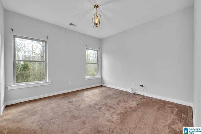 empty room featuring carpet