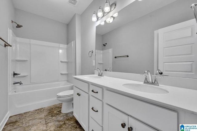 full bathroom with vanity, shower / tub combination, and toilet