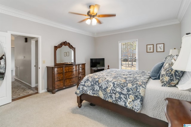 bedroom with ceiling fan, light colored carpet, and ornamental molding