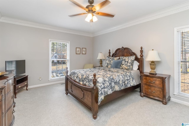 bedroom with multiple windows, crown molding, and light colored carpet