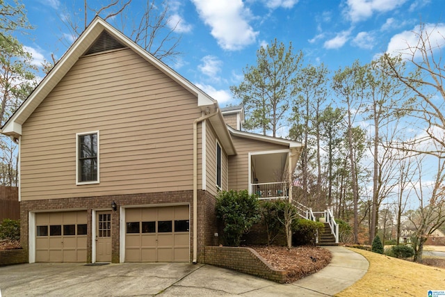 view of side of property with a garage