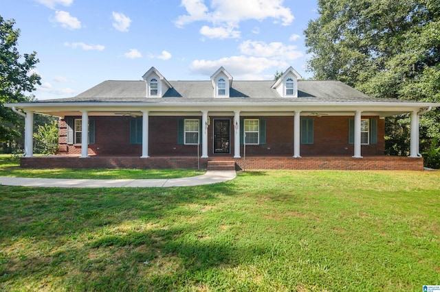 view of front of house with a front lawn and covered porch