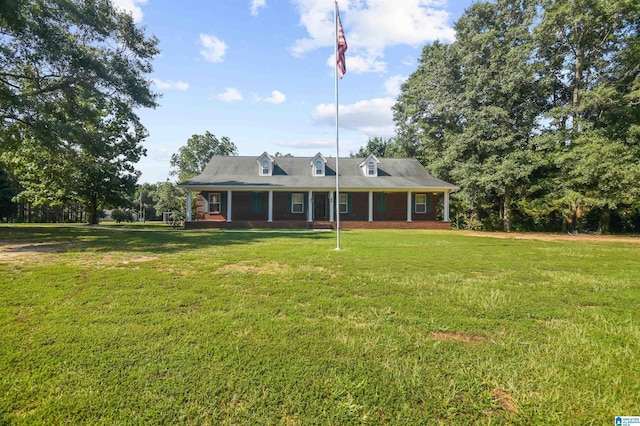 view of front of home with a front yard