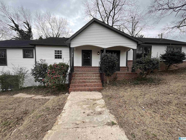 ranch-style house with a porch