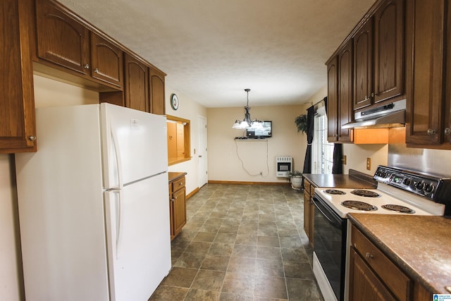 kitchen with heating unit, decorative light fixtures, white fridge, an inviting chandelier, and electric stove