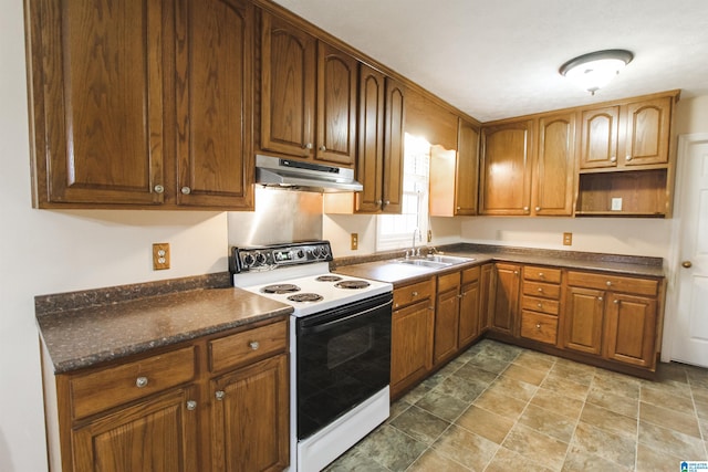 kitchen featuring sink and electric range