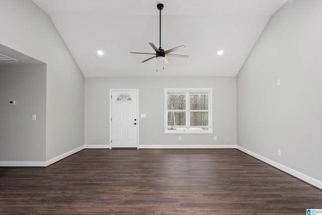 interior space with vaulted ceiling, dark hardwood / wood-style floors, and ceiling fan