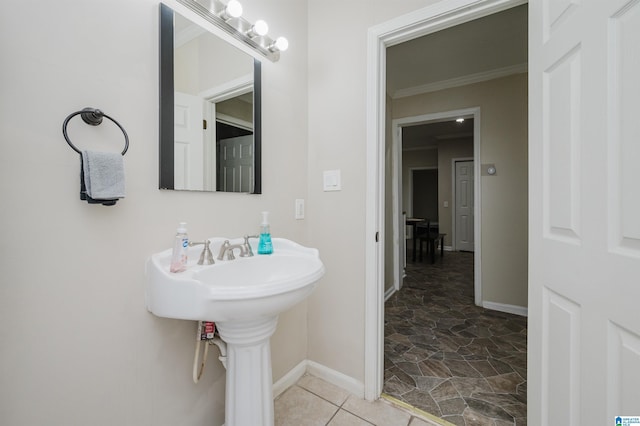 bathroom with ornamental molding